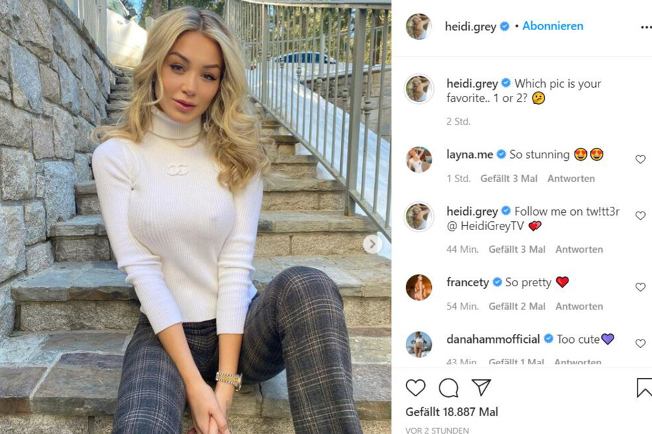 What's peeking through Heidi's top?