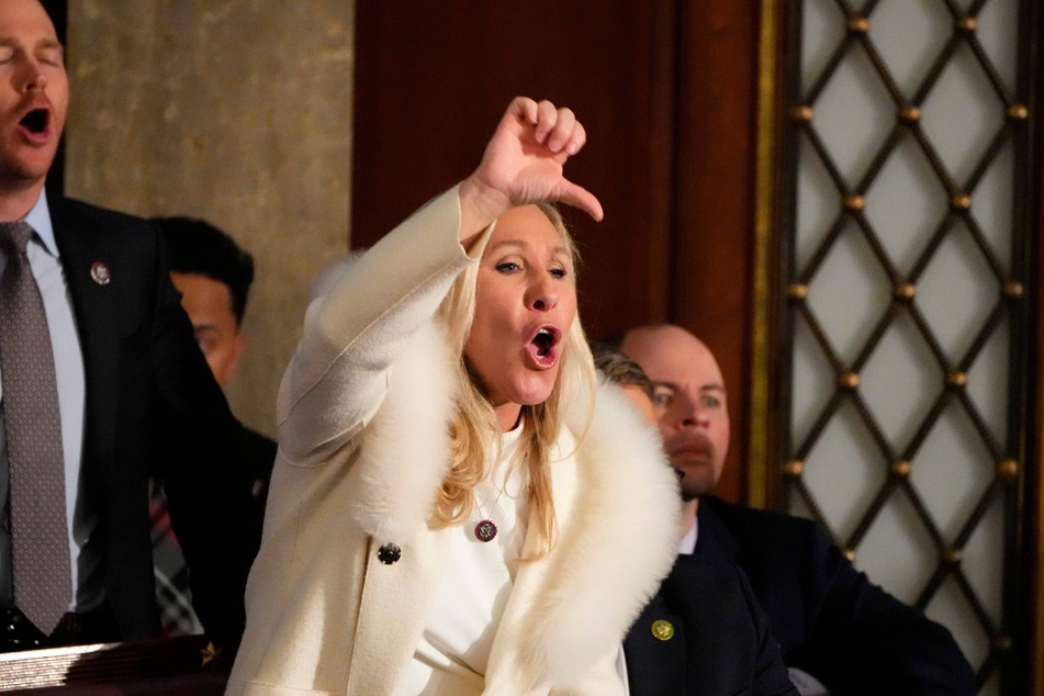 Rep. Marjorie Taylor Greene (c.) yelling and booing as President Joe Biden delivered the State of the Union address in Washington, DC on February 7, 2023.