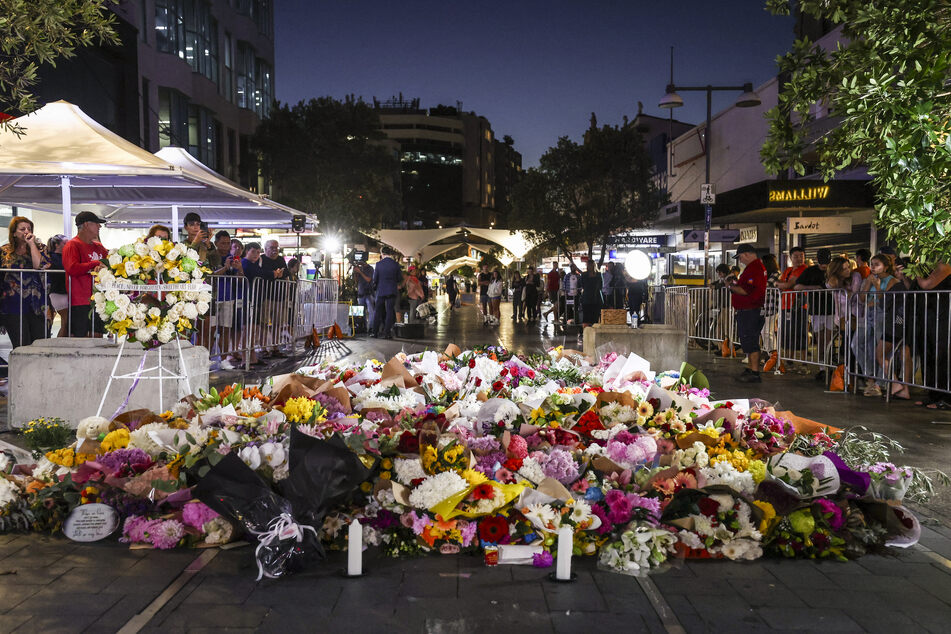 The attacker who killed six people in a stabbing spree at a shopping center in Sydney has been named as 40-year-old Joel Cauchi.