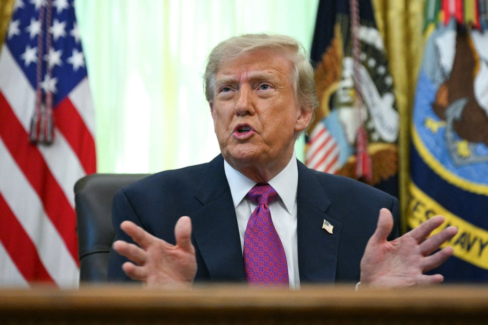 President Donald Trump on Sunday threatened a prominent NBC broadcast journalist with possible punishment by US media regulators.
