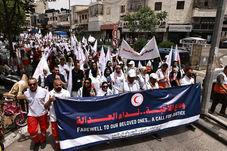 Hundreds march in West Bank rallies against Israeli killings of Palestinian medics