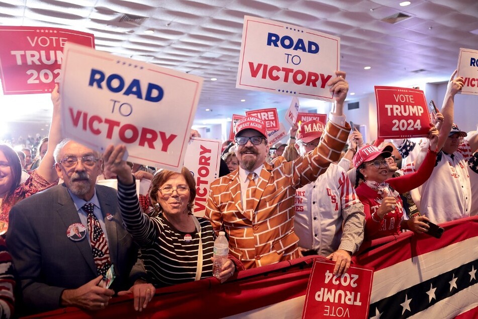 Supporters of Donald Trump cheer during an election night watch party at the State Fairgrounds in Columbia, South Carolina.