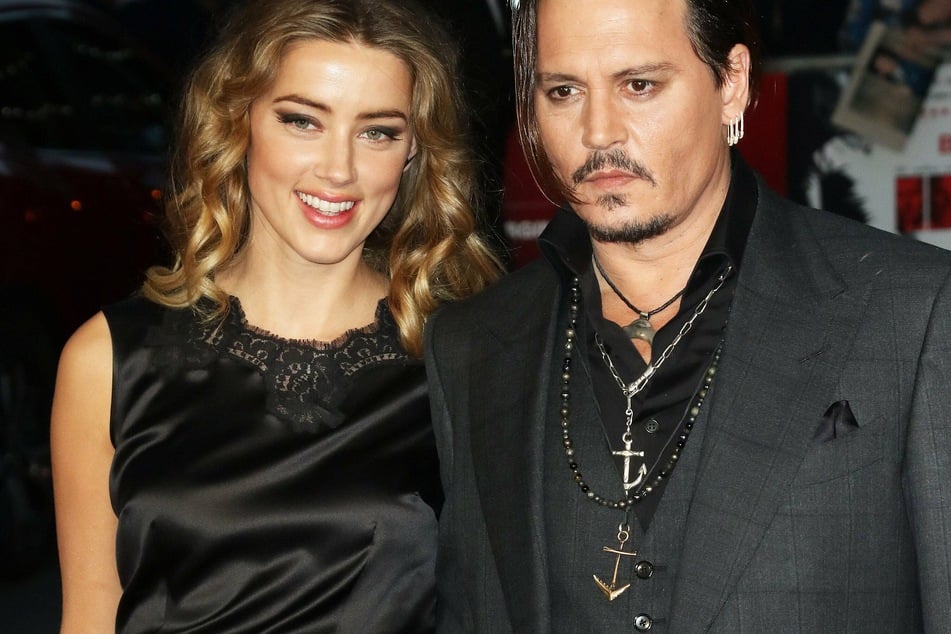 Amber Heard (l) and Johnny Depp (r) in happier days.
