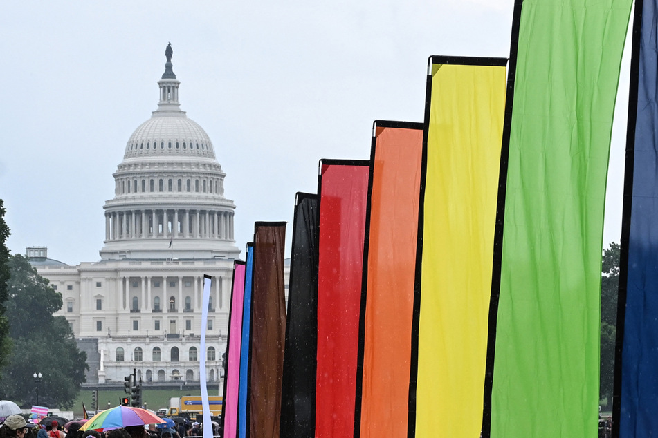 Trump downplays LGBTQ+ rights as he shifts human rights report away from "group identity"