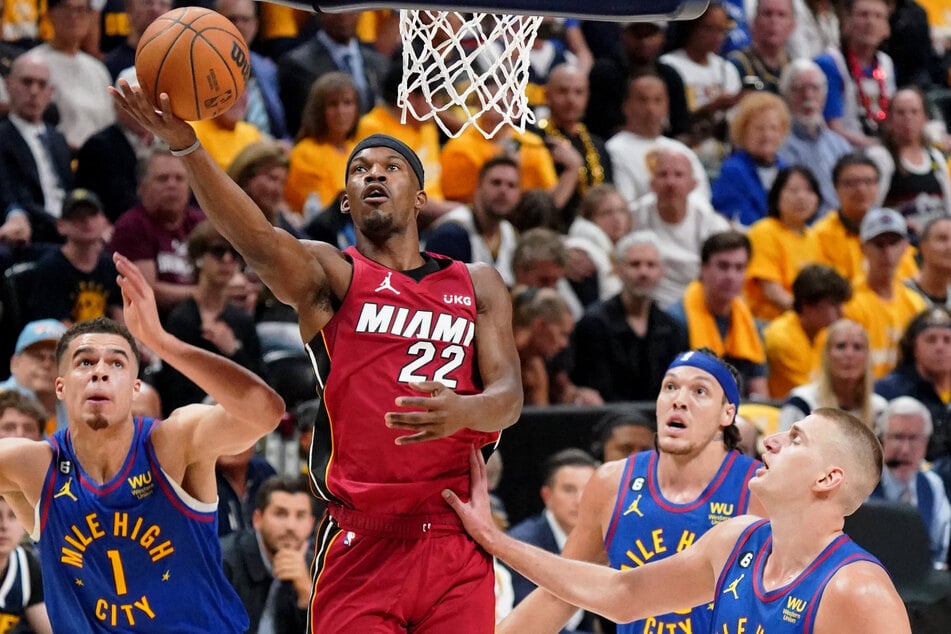 Eastern Conference Finals MVP Jimmy Butler (c.) was held to just 13 points.