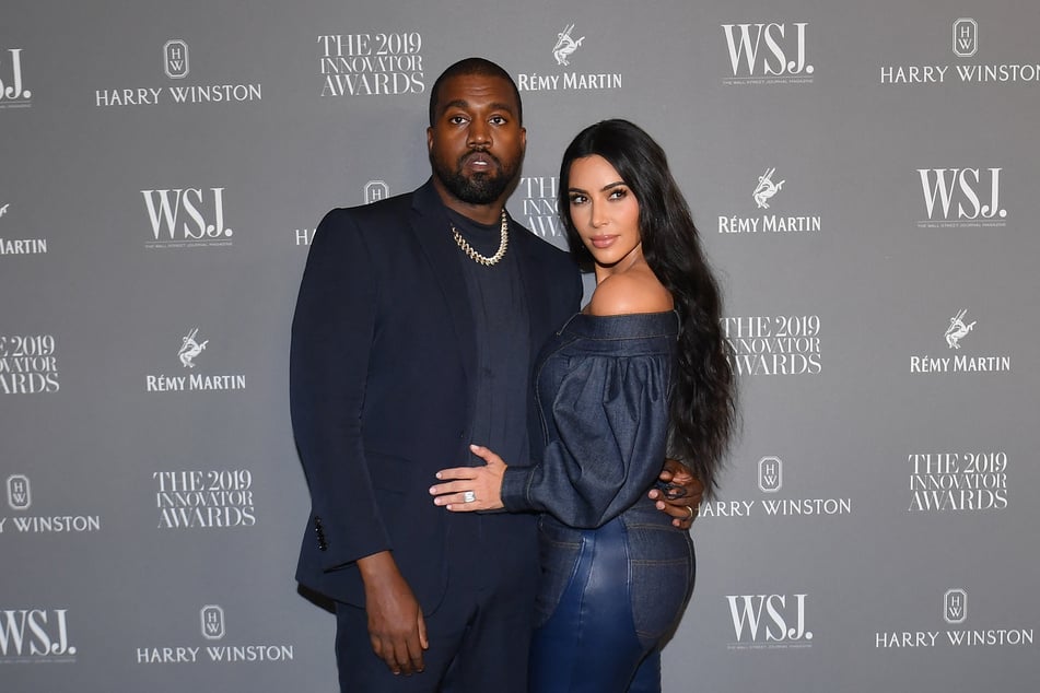 Kim said that co-parenting with Ye (l.) following their 2022 divorce is challenging, though she tries her best to protect their four kids from his erratic behavior.