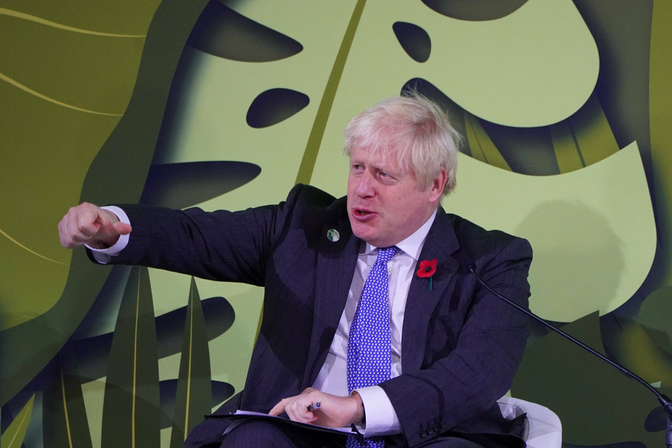 British Prime Minister Boris Johnson chairs the first session at the Leaders Action on Forests and Land-use event during COP26.