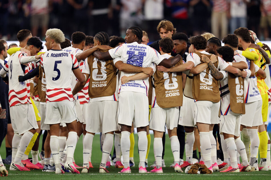 USMNT players celebrate after their World Cup Group D match against Paraguay on June 12, 2026.