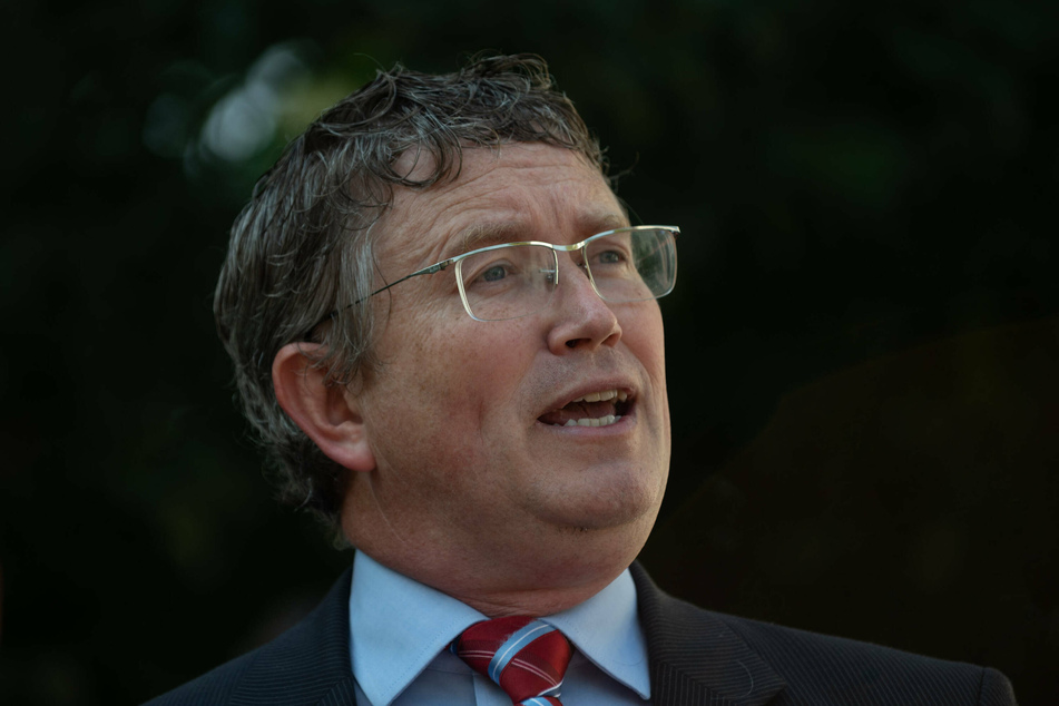 Kentucky Rep. Thomas Massie tweeted an image of his family's holiday greeting card, in which each member carries a large firearm.