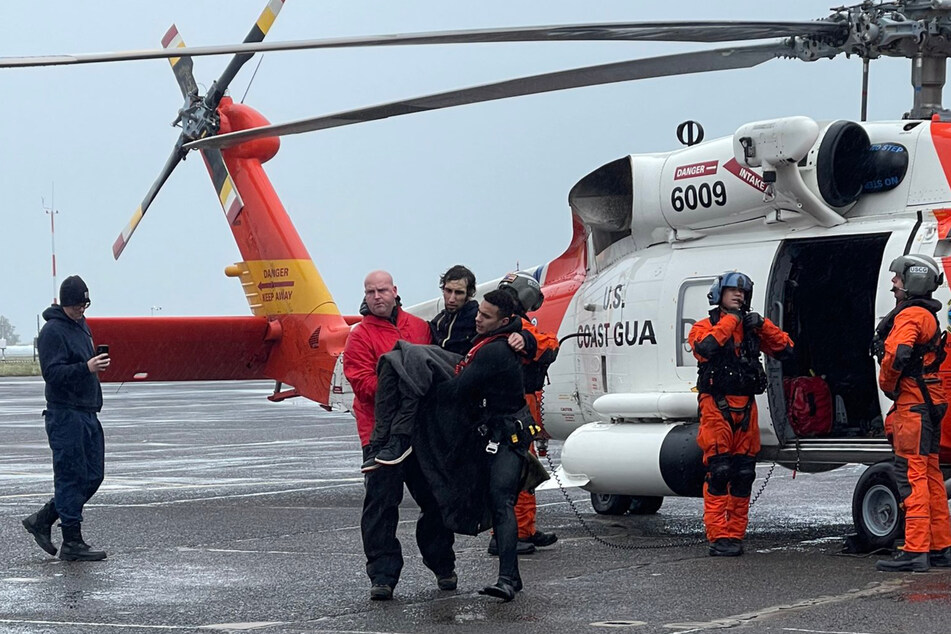 The rescued man was fished out of the water and was taken by helicopter to the Coast Guard base, where he was later treated.