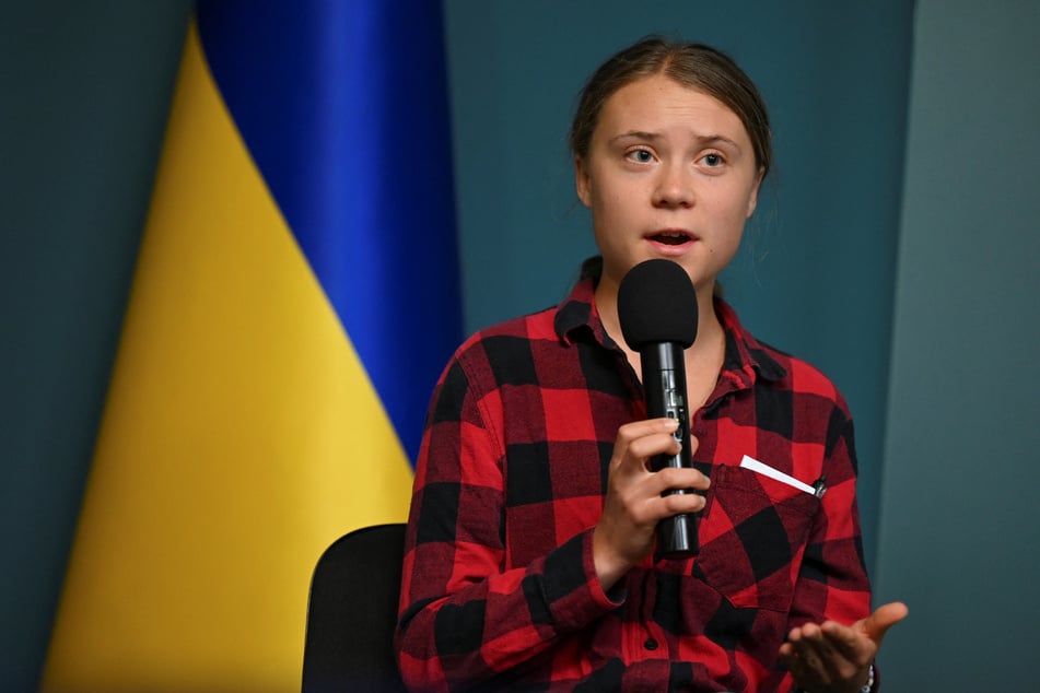 Greta Thunberg, environmental activist and member of the International Working Group on the Environmental Consequences of War, attends a press conference after a meeting with Ukraine's President Volodymyr Zelensky.
