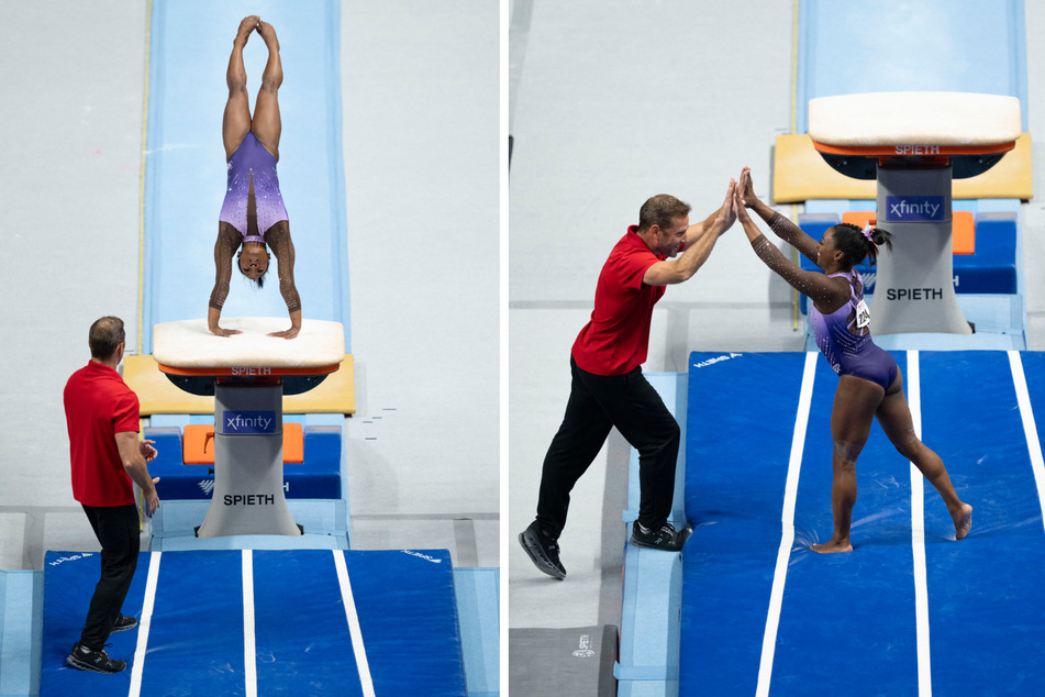 Simone Biles leads US gymnastics championships at halfway stage after impressive vault performance