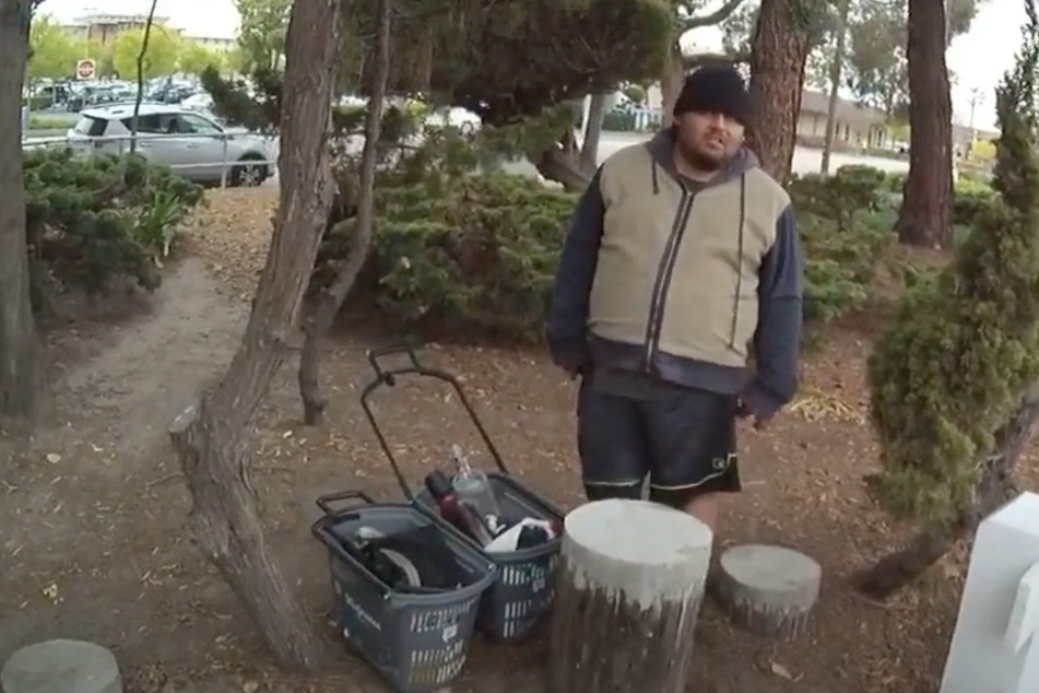 Body camera footage shows the police officers approaching a confused-looking Mario Gonzalez (26).