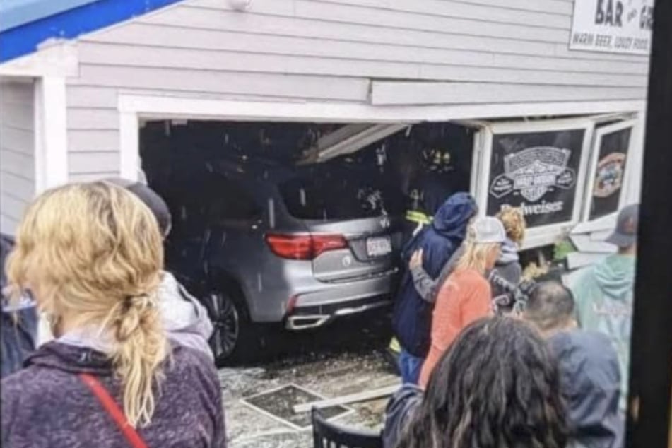 The silver SUV drove through the front of the Looney Bin Bar & Grill in Laconia, New Hampshire, on Sunday.
