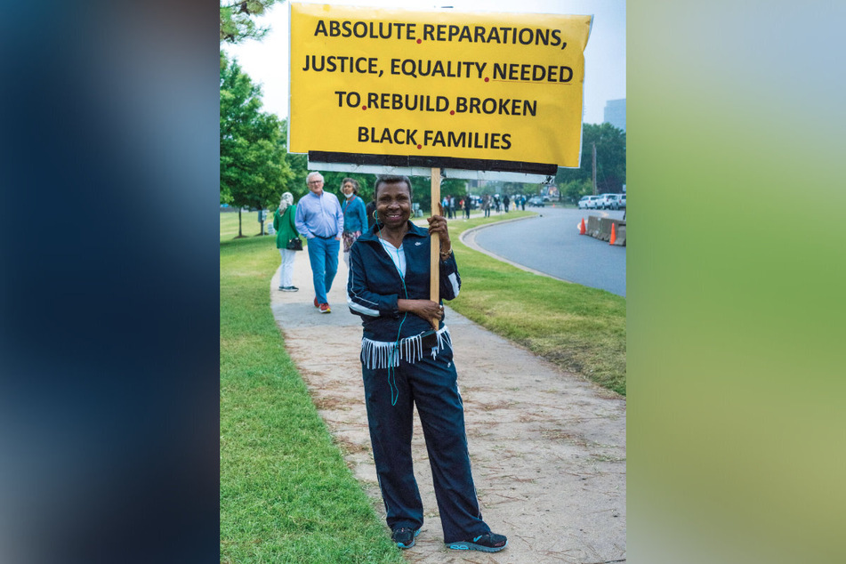 Marchers demand reparations on the 100th anniversary of the 1921 Tulsa Race Massacre.