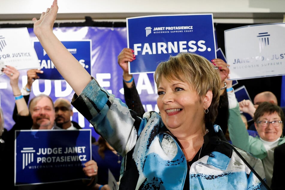 Wisconsin Supreme Court candidate Janet Protasiewicz celebrates after the race was called in her favor during her election night watch party in Milwaukee.