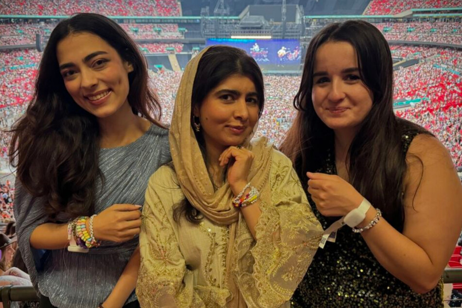 Malala Yousafzai (c.) opened up about her and her friends' love of Taylor Swift in a sweet Instagram post from The Eras Tour.