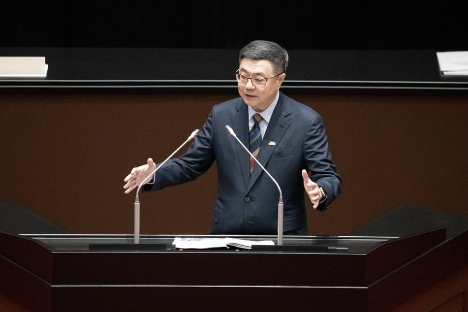 Taiwan's Premier Cho Jung-tai delivers a policy address during a session at the parliament in Taipei on February 25, 2025. He has stated that Taiwan is seeking a stable energy supply.