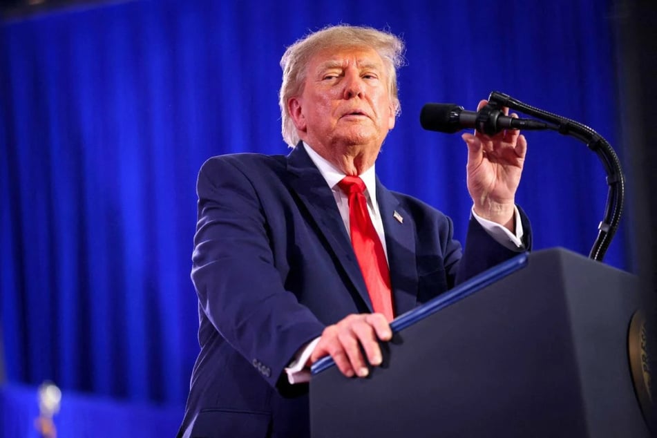 President Donald Trump speaks at a rally at Sioux Gateway Airport on October 22, 2026 in Sioux City, Iowa. On Friday, Trump criticized the judge overseeing the Charlie Kirk assassination case for moving too slowly.