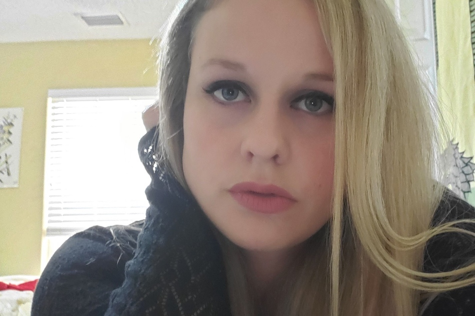 Armed police raided the home of former Florida Department of Health scientist Rebekah Jones.