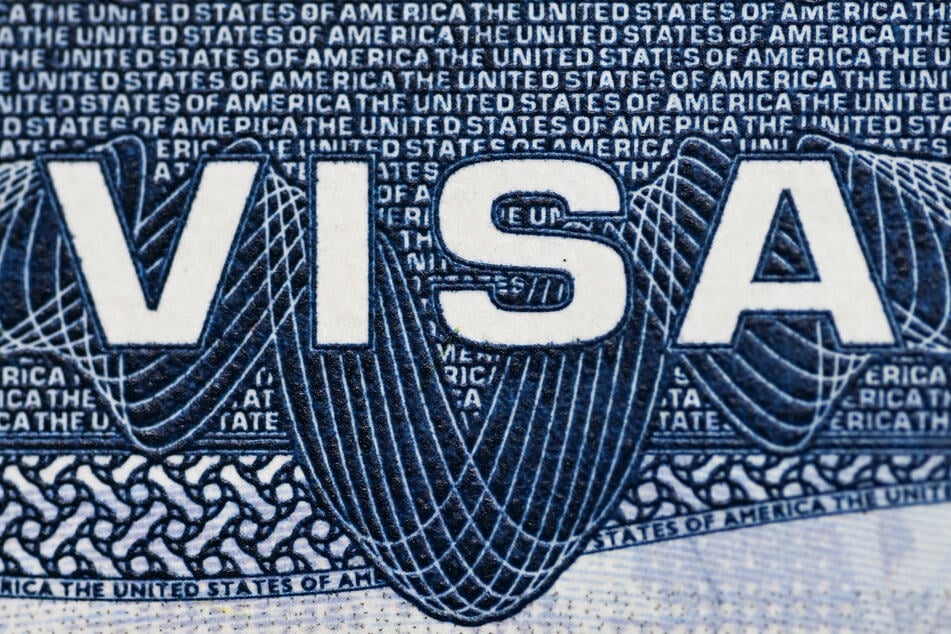 A US visa is pictured in a passport in Mexico City on August 25, 2026.