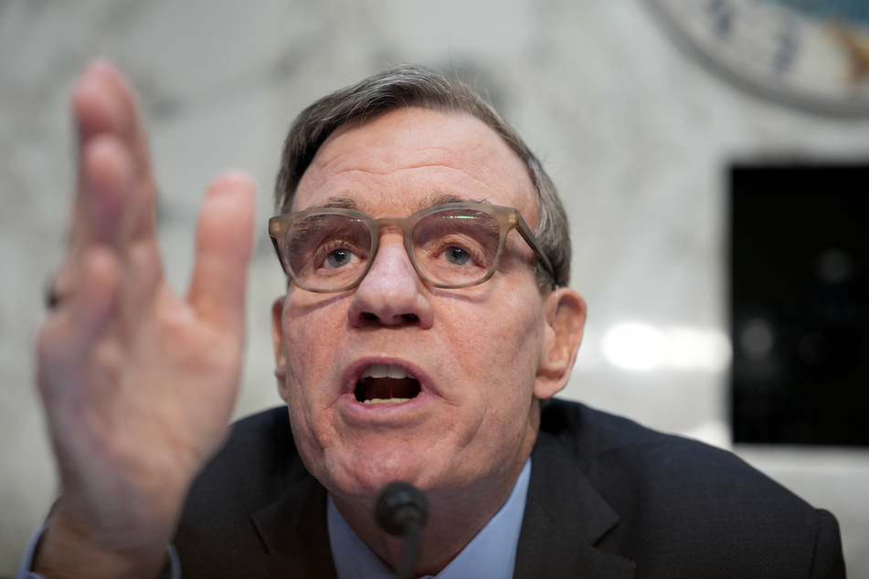 Democratic Vice Chair Mark Warner pressed the White House intelligence officers over how military plans could be posted in Signal.