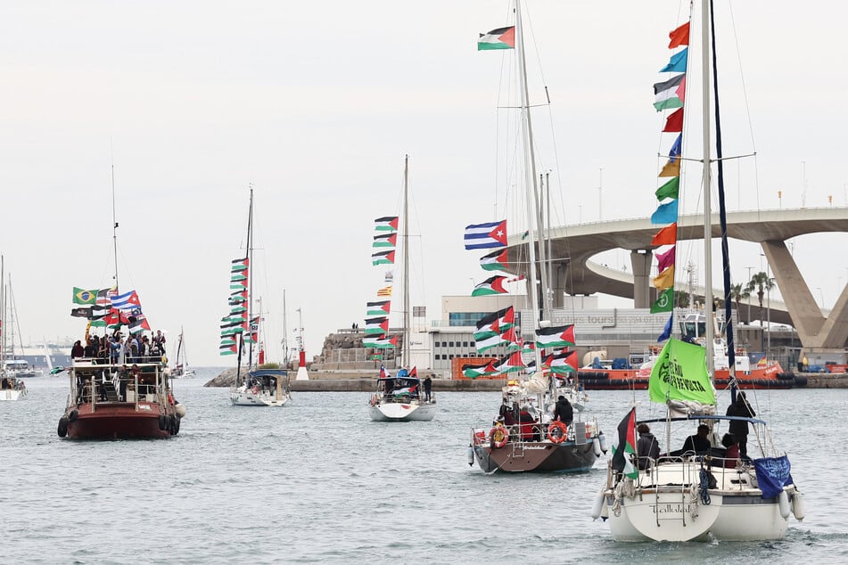 Boats of a humanitarian flotilla bound for the Gaza Strip make a symbolic leave from Barcelona's Port Vell on April 12, 2026.