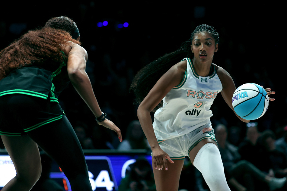 Angel Reese #5 (r) of the Rose dribbles the ball against Kiki Iriafe #44 of the Phantom during the fourth quarter of the Unrivaled 2026 game at Sephora Arena on February 27, 2026 in Medley, Florida.