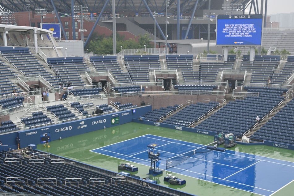 Stubborn rain delayed the US Open's outer matches for several hours on Tuesday.
