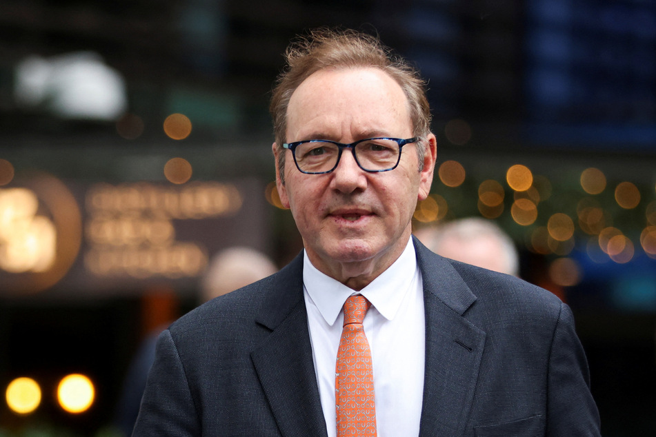 Kevin Spacey walks outside Southwark Crown Court, as his trial over charges related to allegations of sex offenses draws to a close.