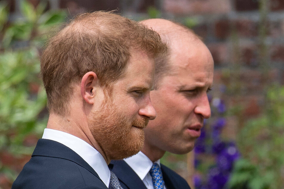 Prince William (l) and Prince Harry (r) both appear in a new documentary about their grandfather, but it's not clear if they filmed together or if they have reconciled.