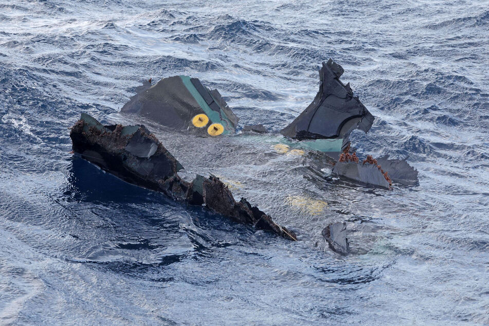 A floating object believed to belong to the U.S. military aircraft V-22 Osprey that crashed into the sea is seen off Yakushima Island in western Japan.