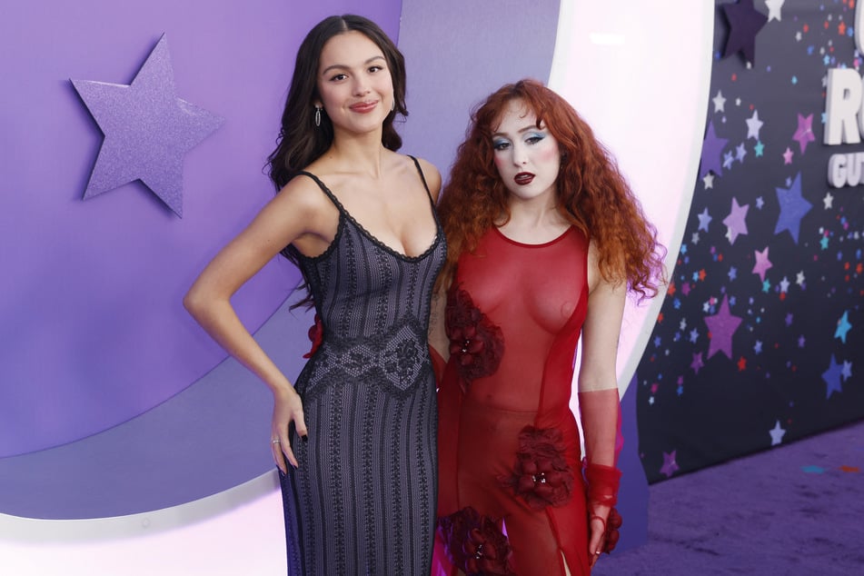 Olivia Rodrigo (l.) and Chappell Roan attend the Los Angeles premiere Of Netflix's Olivia Rodrigo: Guts World Tour in Los Angeles on October 25, 2024. Both singers are playing the Daisy Chain Fields music festival on August 29, 2026.