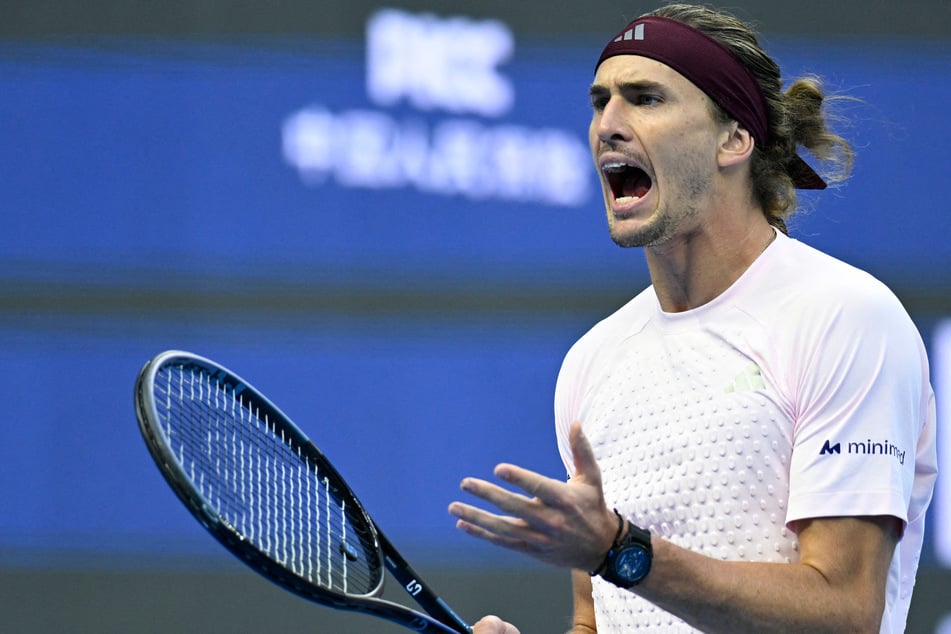 Alexander Zverev reacts during the men's singles first-round tennis match at the China Open on October 1, 2026. The world number two has hit back at recent discussions about shortening men's Grand Slam matches. 