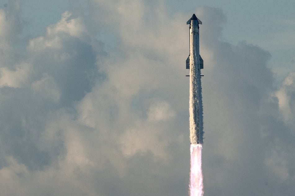 Elon Musk's SpaceX puts Starship megarocket in orbit for first time in closely-watched launch