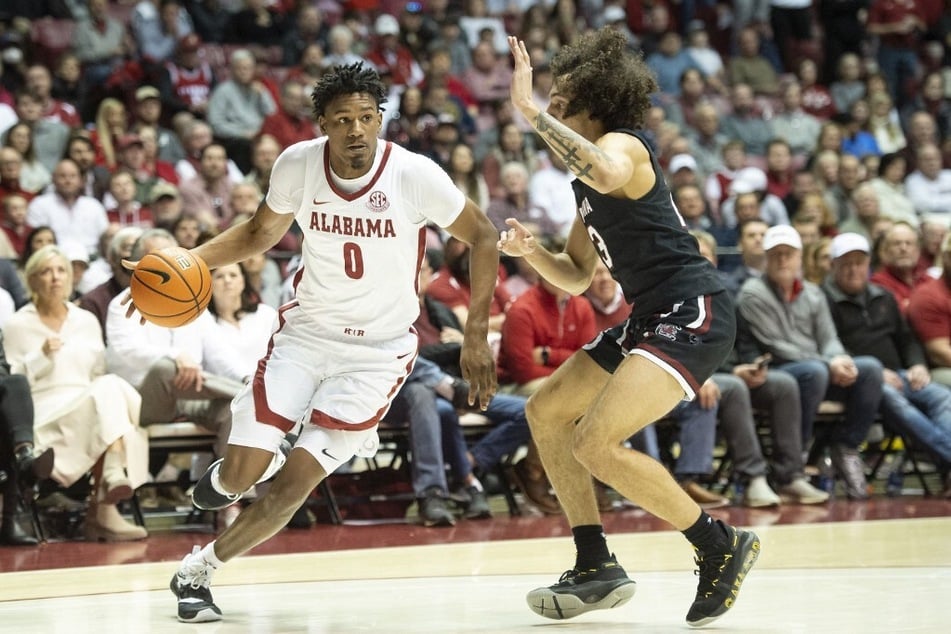 Graduate student Noah Gurley (l) spoke out for the first time following former teammate Darius Miles' arrest.
