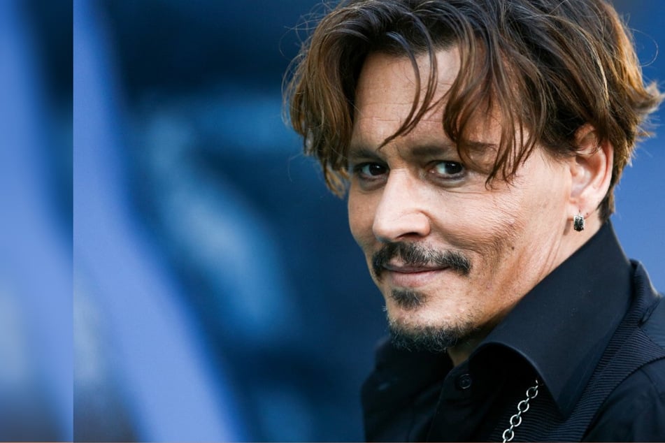 Johnny Depp settles City of Lies assault case, but makes racism claim