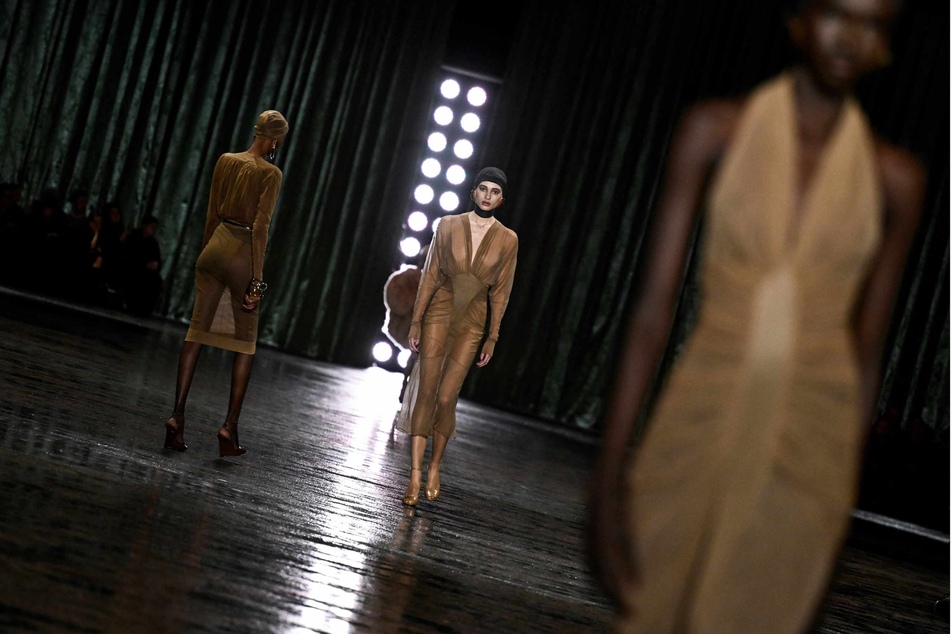 A model presents a creation by Saint Laurent for the Women Ready-to-wear Fall-Winter 2024/2025 collection as part of the Paris Fashion Week, in Paris on Wednesday.