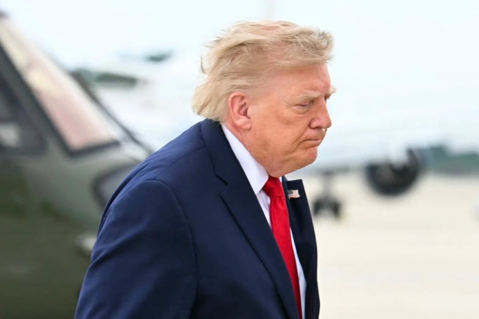 President Donald Trump is seen on his way to board Air Force One at Joint Base Andrews, Maryland, on September 26, 2026. A federal judge on Friday held President Donald Trump's administration in contempt for deporting an asylum seeker twice despite a court order against it.