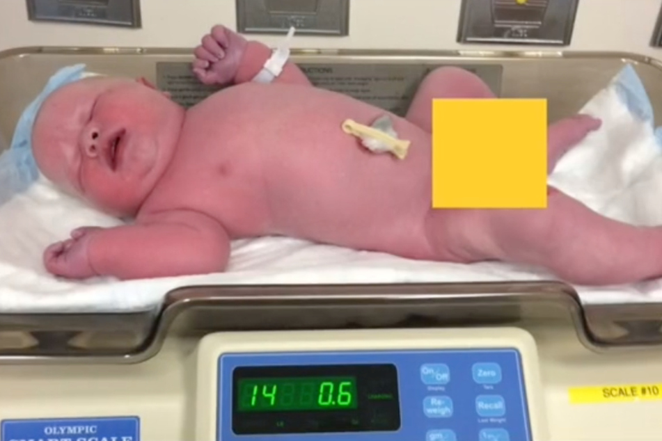 The first weigh in: the boy weighed more than 14 pounds at birth.