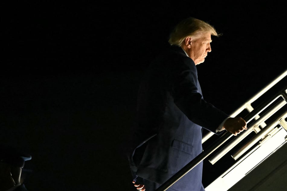 President Donald Trump boards Air Force One following a rally in Nebraska. During the event, he told supporters that he'll waive the off-road requirement for tax-free red-dyed diesel.