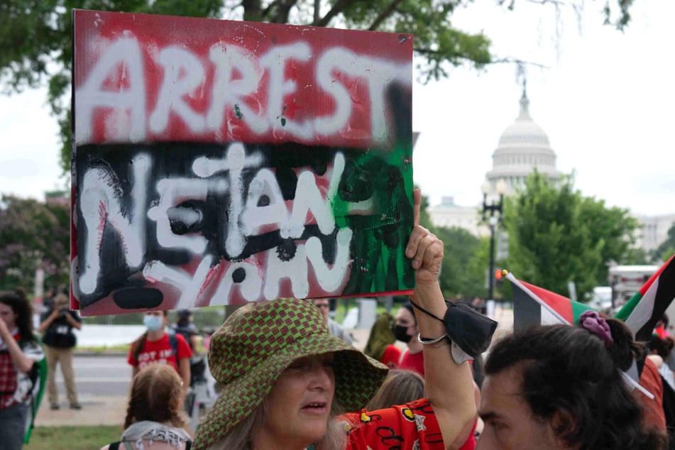 Thousands protest Netanyahu's Congress visit and call for his arrest over Gaza war crimes