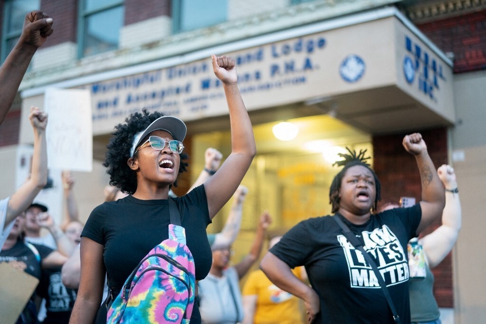 Black Lives Matter supporters march against white supremacy after a racist shooting at a Dollar General store in Jacksonville, Florida.
