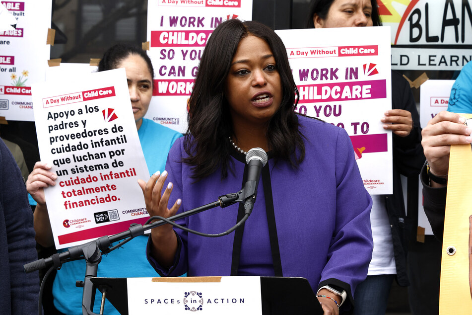 Ward 4 Councilmember Janeese Lewis George joins parents, educators, organizers, and their children at a rally to demand funding for the Pay Equity Fund and childcare subsidies at Washington DC's Blandis Child Learning Center on March 27, 2026