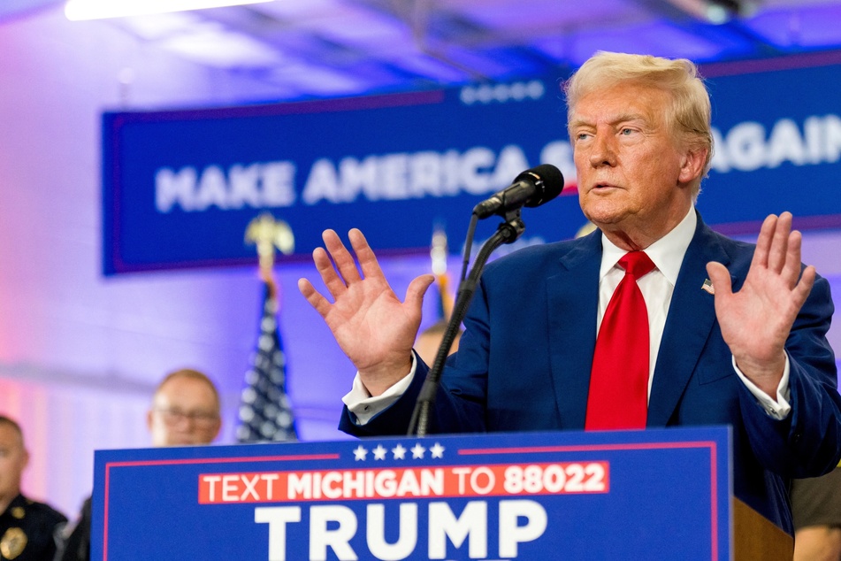 Trump vows to shield police from legal accountability during Michigan rally