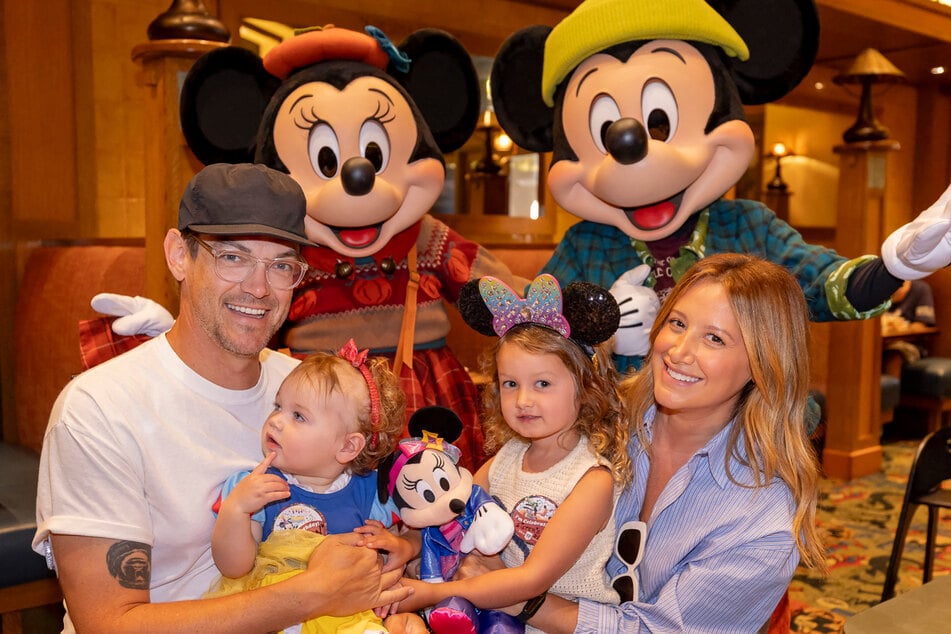 Ashley Tisdale (r.) shares two kids with her husband Christopher French (l.), whom she wed in 2014.
