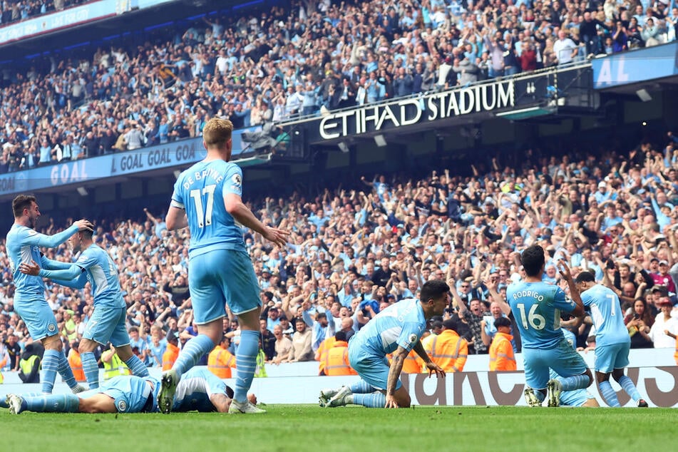Manchester City pip Liverpool to Premier League title in heart-stopping finale