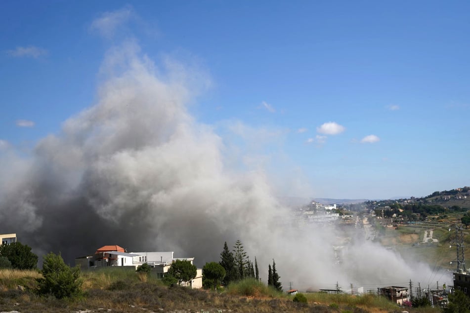 Smoke rises from the site of an Israeli airstrike that targeted the southern Lebanese village of Kfar Roummane on June 13, 2026.