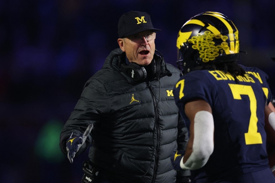 Coach Jim Harbaugh accepts suspension as Michigan cheating investigation is closed