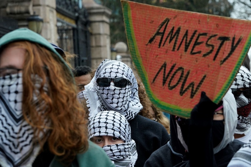Pro-Palestinian protesters demonstrate outside Barnard College in New York and demand amnesty for expelled students.